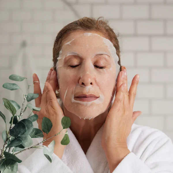 Skin Formulas Hydra Sheet Mask on a woman's face